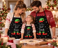 Rodzinne pieczenie świątecznych ciastek w personalizowanych fartuszkach